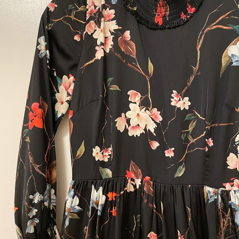 Black floral, high neck dress.